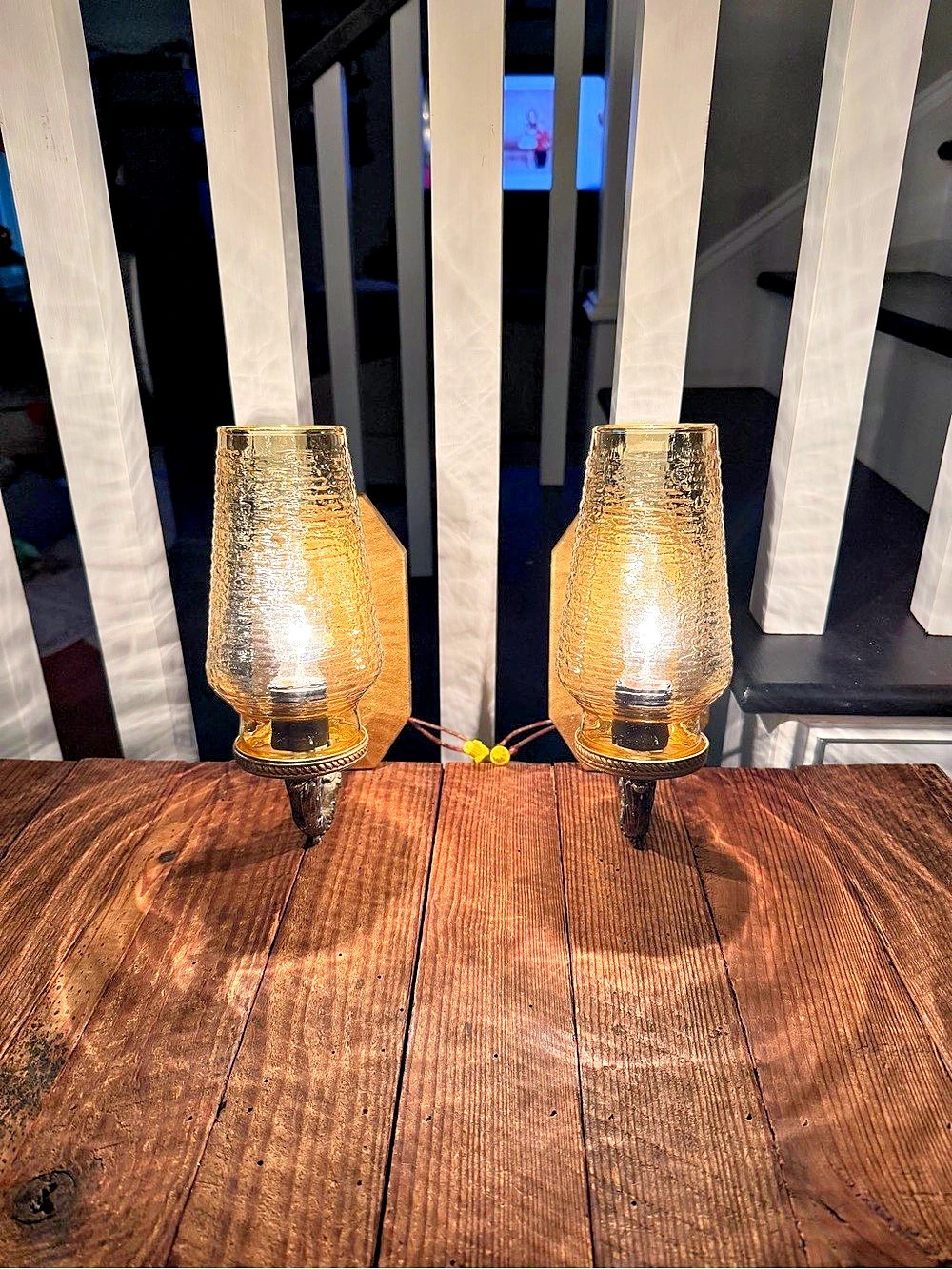 Pair of Vintage MCM Gold Wall Sconces with Amber Glass Shades